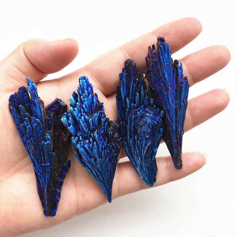 This Titanium Aura Black Kyanite Spear is grounding crystal helping with spiritual growth, clearing energies, grounding and protection. This crystal can help with communicating with your Spirit Guides, balancing your body and mind, adjust your emotions and aiding in concentration. Neometacosmic.com